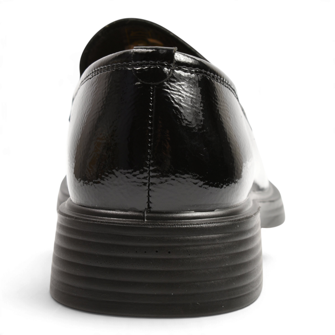 Back view of black patent leather Anna Viotti loafers with a flexible ridged sole for daily comfort.