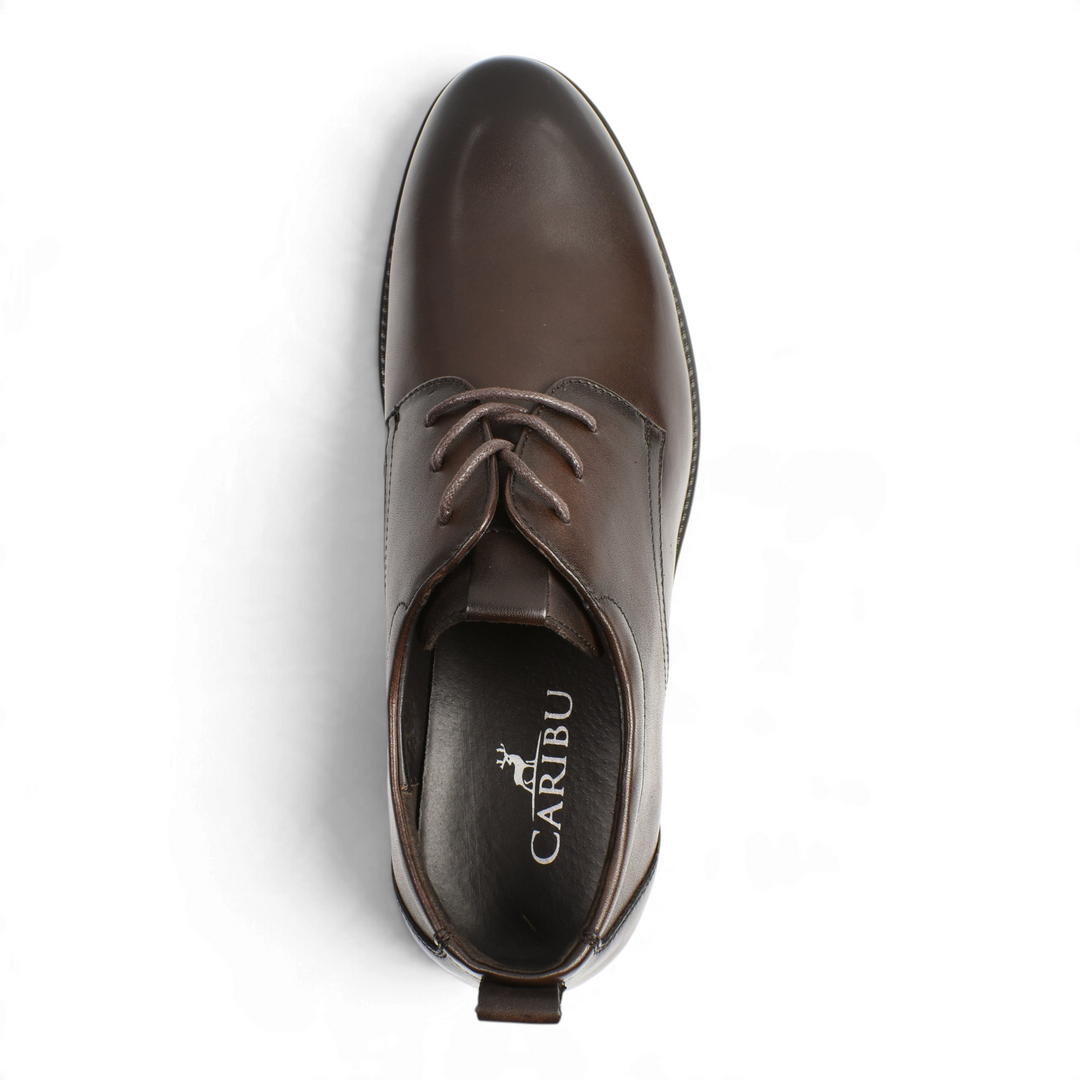 Top view of brown leather Otter Derby shoes with laces and Caribu branding on the insole