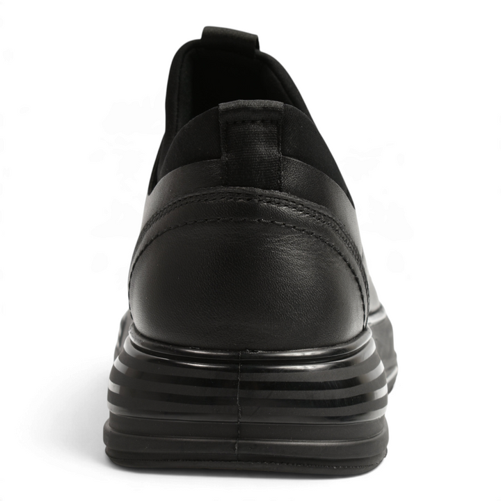 Back view of black leather Otter casual shoes with a thick, striped sole and elastic collar from ada-shoes.ro