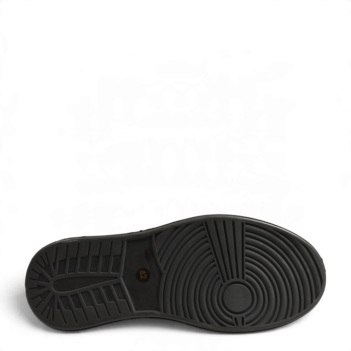 Black flexible rubber sole of an Otter casual shoe with a textured tread pattern for grip, from ada-shoes.ro