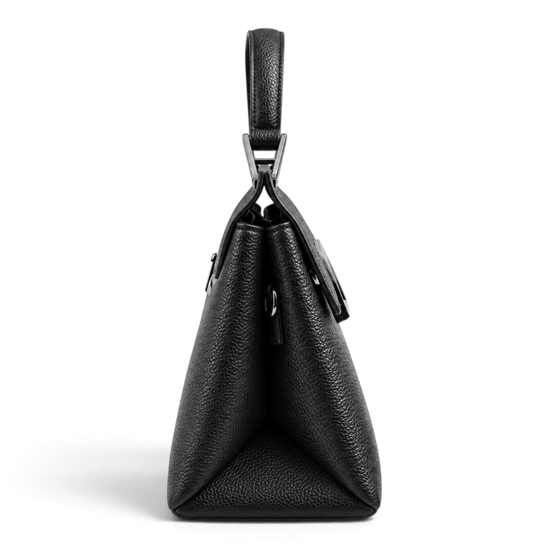 Side view of a black structured leather handbag from ada-shoes.ro with a top handle and gunmetal hardware.