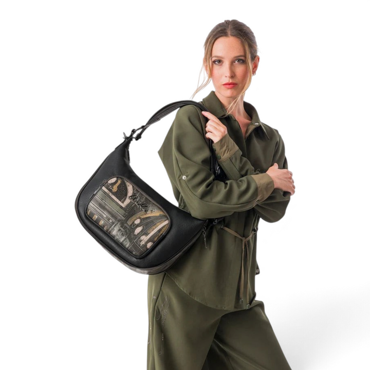 Model wearing an Anekke hobo shoulder bag in black and grey with artistic metallic details from ada-shoes.ro