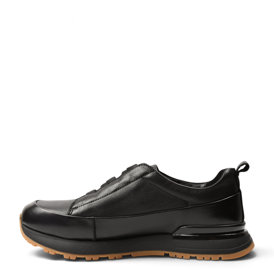 ada-shoes.ro black leather slip-on sneakers with elastic bands and a gum-colored lug sole, side view.