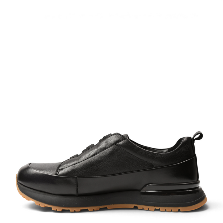 ada-shoes.ro black leather slip-on sneakers with elastic bands and a gum-colored lug sole, side view.