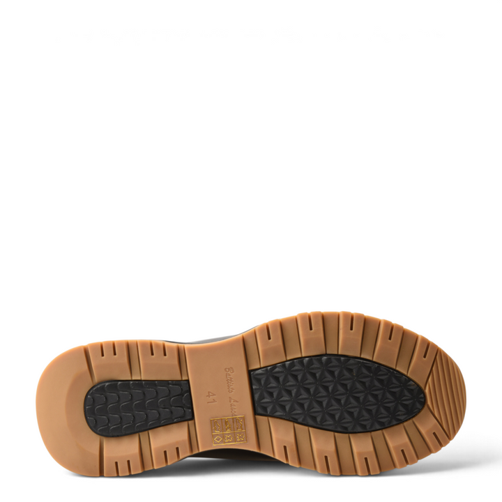 ada-shoes.ro black leather sneakers featuring a durable, tan-coloured rubber lug sole for superior grip and traction.