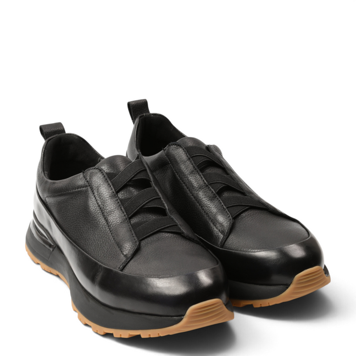 ada-shoes.ro black leather slip-on sneakers with elastic bands and a natural gum sole for a casual urban look.